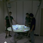 A Projector-Based Physical Sand Table for Tactical Planning and Review